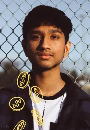 a boy standing in front of a safety net with gold coins flying